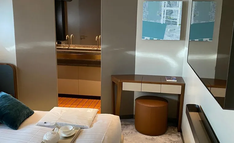 Luxurious bedroom interior of 2024 Azimut Magellano 30M yacht with modern decor.