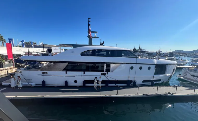 2024 Azimut Magellano 30M yacht docked in a sunny marina.