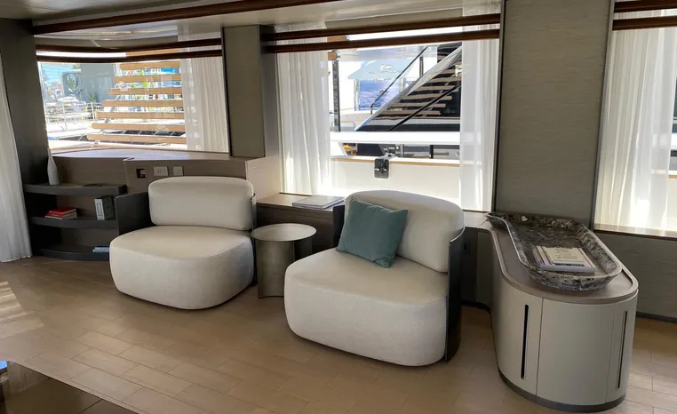 Luxurious interior of 2024 Azimut Magellano 30M yacht with modern seating and decor.