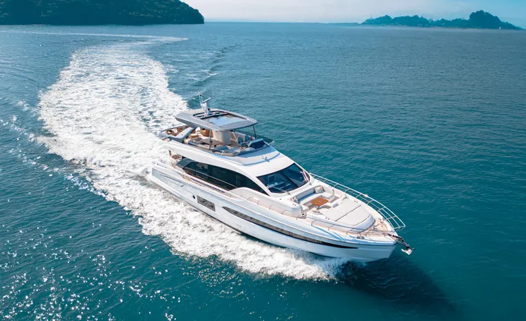 Azimut Fly 78 yacht cruising on open sea, 2025 model, luxury maritime travel.