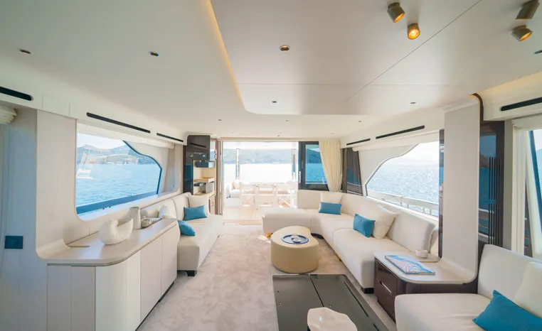 Luxurious interior of 2025 Azimut Fly 78 yacht with elegant seating and ocean views.