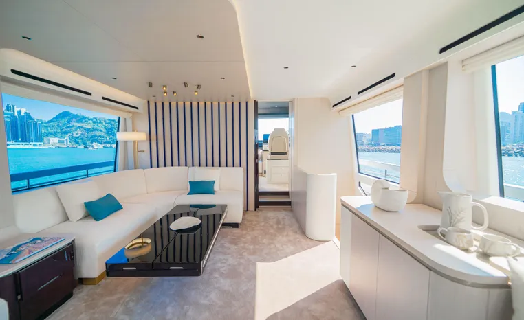 Luxurious interior of 2025 Azimut Fly 78 yacht with modern design and panoramic windows.