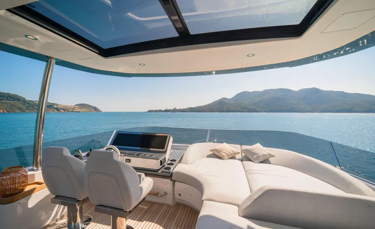 Luxurious 2025 Azimut Fly 78 yacht interior with panoramic sea view.